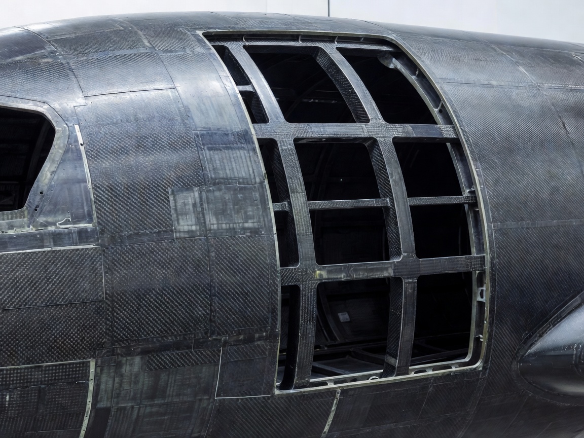 Aircraft fuselage section showing advanced composite material structure